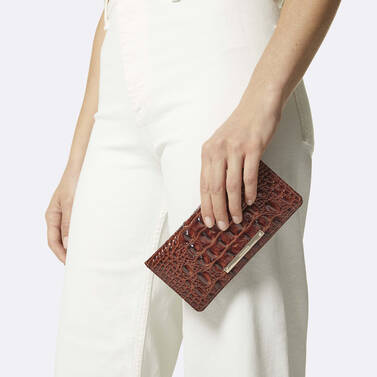 Ady Wallet Charming Python Ombre Melbourne on figure for scale