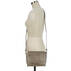 Carrie Crossbody Beige Portsmouth on figure for scale